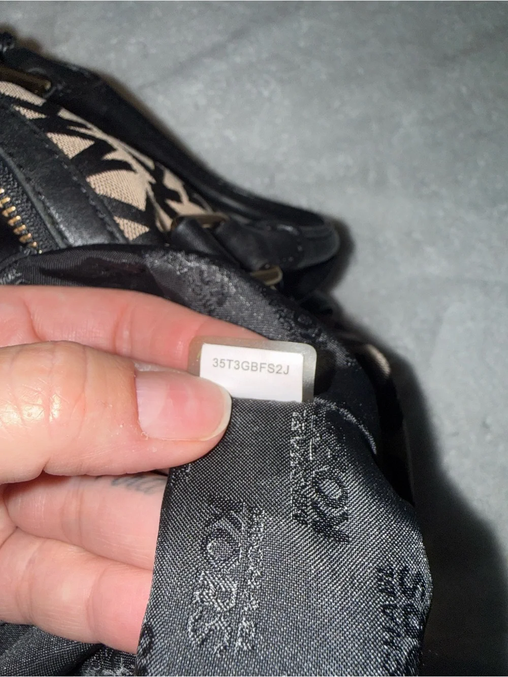 Michael Kors black duffle signature bag